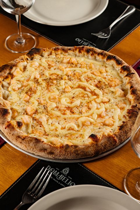 Dom Helio Restaurant signature dishes Chicken With Catupiry
Calabrese
Portuguese Pizza